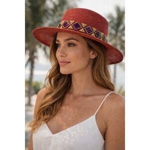 Red woven wide brim hat with geometric decorative band